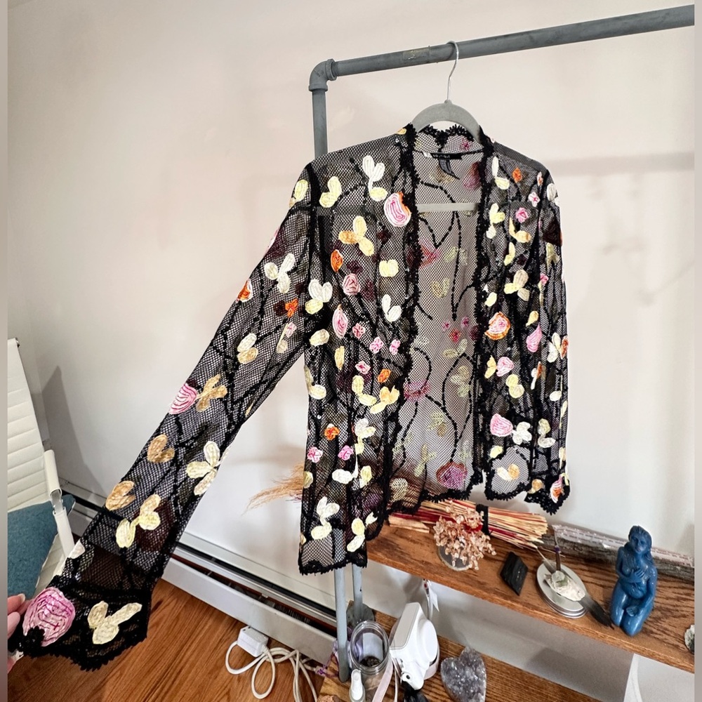 Sheer black blazer with colorful floral stitching
